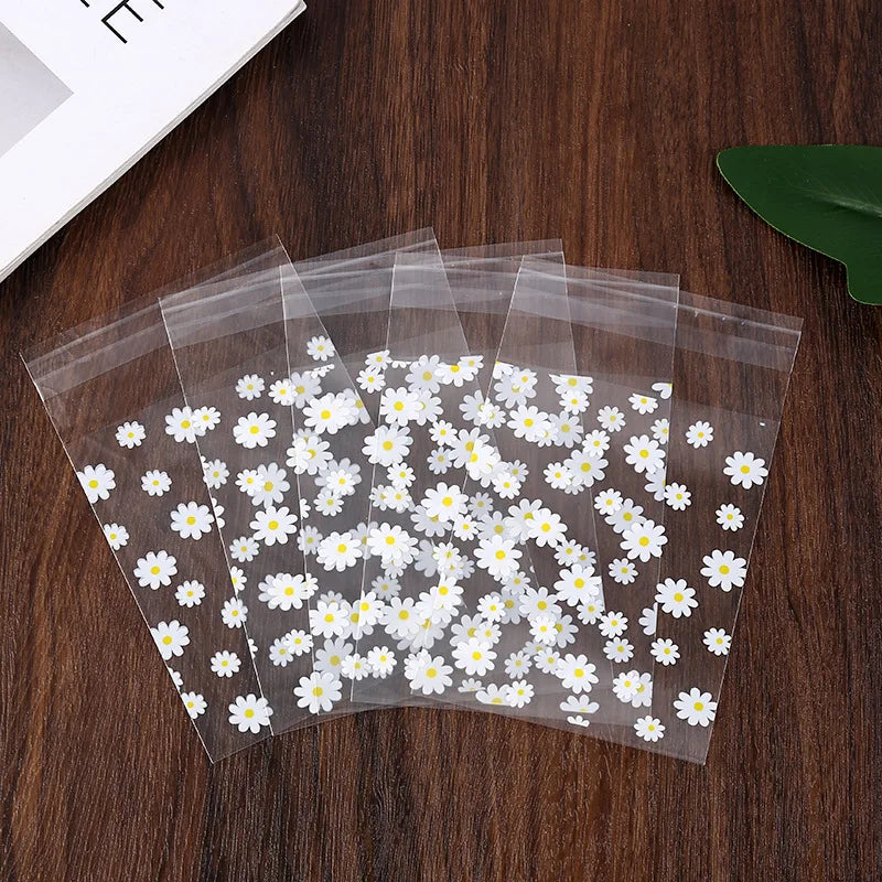 Kidslands® - Lot de 50/100 Sachets Cadeaux Plastiques Marguerites – Sacs de Rangement Transparents pour Fête, Mariage, Cookies ou Cadeaux