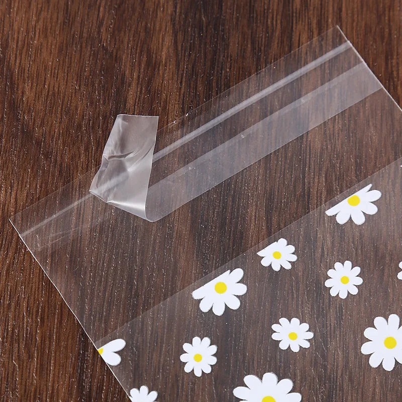 Kidslands® - Lot de 50/100 Sachets Cadeaux Plastiques Marguerites – Sacs de Rangement Transparents pour Fête, Mariage, Cookies ou Cadeaux