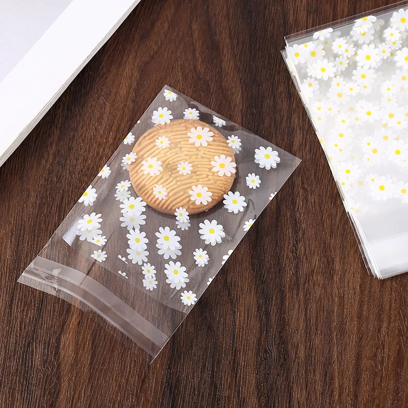 Kidslands® - Lot de 50/100 Sachets Cadeaux Plastiques Marguerites – Sacs de Rangement Transparents pour Fête, Mariage, Cookies ou Cadeaux