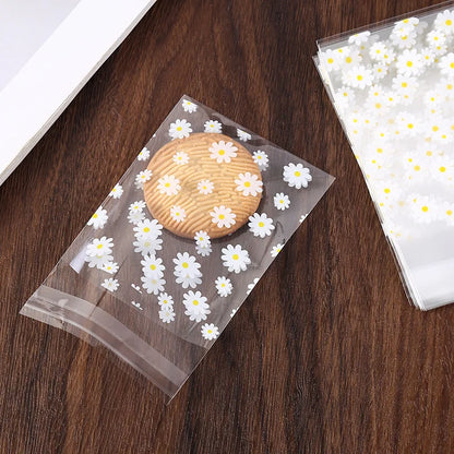 Kidslands® - Lot de 50/100 Sachets Cadeaux Plastiques Marguerites – Sacs de Rangement Transparents pour Fête, Mariage, Cookies ou Cadeaux